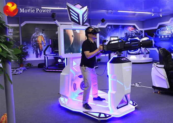 Συναρπαστικό πυροβόλο όπλο Vive μηχανών παιχνιδιών Gatling Arcade αλληλεπίδρασης, που στέκεται επάνω τον προσομοιωτή πυροβολισμού 9D VR 0